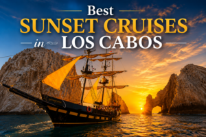 Buccaneer Queen tall ship sailing past El Arco during the best sunset cruises in Los Cabos